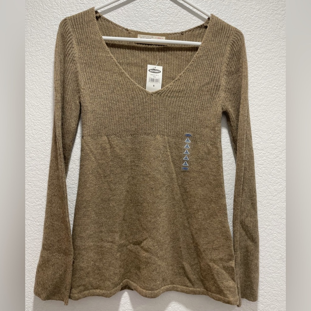 Old Navy sand colored v-neck sweater.